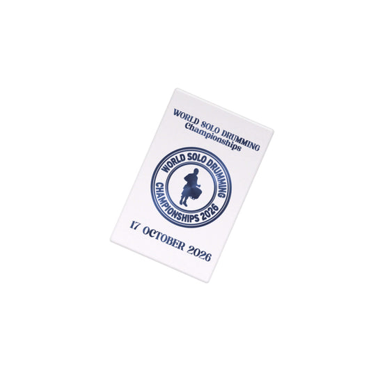 White ceramic fridge magnet with World Solo Drumming Championships logo in navy